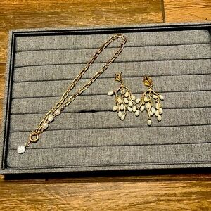 Gold costume jewelry necklace and earrings combo.